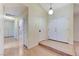 Hallway featuring laminate floors, an open floor plan, and lots of storage at 3360 Paso Andres St, Las Vegas, NV 89146