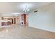 Living room showcases open floor plan to kitchen at 3360 Paso Andres St, Las Vegas, NV 89146