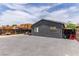 Charming home exterior with brick patio, mature tree and easy backyard access at 3417 Lillis Cir, North Las Vegas, NV 89030