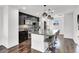 Stylish kitchen with modern cabinets, stainless steel appliances, and island seating at 382 Gracious Way, Henderson, NV 89011