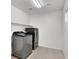 Bright laundry room with modern washer and dryer, offering convenience and efficiency at 382 Gracious Way, Henderson, NV 89011
