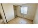 The bedroom has a window overlooking the yard, as well as a closet at 3974 Palos Verdes St, Las Vegas, NV 89119