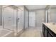 Modern bathroom with glass enclosed shower and large tile flooring at 4 Lomita Heights Dr, Las Vegas, NV 89138