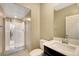 Bathroom featuring a glass shower, white toilet, and vanity with a sink at 4 Lomita Heights Dr, Las Vegas, NV 89138
