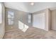 Sunny bedroom featuring neutral walls, carpeted floors, and closet at 4 Lomita Heights Dr, Las Vegas, NV 89138
