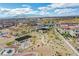 A community common area with picnic tables and a fire pit with landscaped walking paths at 4 Lomita Heights Dr, Las Vegas, NV 89138