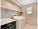 Laundry room with storage and modern washer/dryer at 4 Lomita Heights Dr, Las Vegas, NV 89138