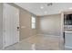 Bright living area with marble floors, and an entrance leading to the kitchen at 4 Lomita Heights Dr, Las Vegas, NV 89138