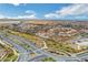 Scenic aerial view of a well-planned neighborhood showcasing modern homes, landscaped streets, and community amenities at 4 Lomita Heights Dr, Las Vegas, NV 89138