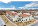 Beautiful street view of new homes featuring desert landscaping and stylish exteriors at 4 Lomita Heights Dr, Las Vegas, NV 89138