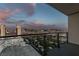 Relax on this balcony and enjoy panoramic city views at dusk at 4381 Flamingo Rd # 2612, Las Vegas, NV 89103