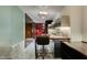 Efficient kitchenette featuring stainless steel appliances and a stylish bar area at 4381 Flamingo Rd # 2612, Las Vegas, NV 89103