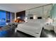 An elegant suite offering a seating area, skyline views, and a king-sized bed, blending comfort with luxury at 4381 Flamingo Rd # 2612, Las Vegas, NV 89103