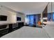 A bright suite with a large bed, city views from the balcony, and modern furnishings creating a luxurious ambiance at 4381 Flamingo Rd # 2612, Las Vegas, NV 89103