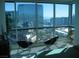Bright condo interior with stunning views of the Las Vegas skyline through large windows at 4525 Dean Martin Dr # 2901, Las Vegas, NV 89103