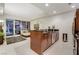 Modern kitchen with stainless steel appliances and a view of the city from the adjacent living room at 4525 Dean Martin Dr # 2901, Las Vegas, NV 89103