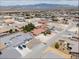 Expansive aerial view showcasing the neighborhood's layout and mountain views at 4650 Stoneham St, Pahrump, NV 89061