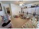 Neutral toned bedroom with a closet and white built-in storage with lots of things on the floor at 4650 Stoneham St, Pahrump, NV 89061