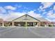 Artesia Community Center, displaying the building's facade and ample parking at 4650 Stoneham St, Pahrump, NV 89061