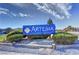 Artesia at Hafen Ranch community sign with blue skies and attractive landscaping at 4650 Stoneham St, Pahrump, NV 89061