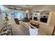 Comfortable living room featuring a cozy fireplace and neutral color palette at 4650 Stoneham St, Pahrump, NV 89061