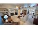 Spacious living room with fireplace, and neutral decor, ideal for relaxation at 4650 Stoneham St, Pahrump, NV 89061