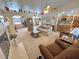 Inviting living room featuring a fireplace and an open layout to the kitchen at 4650 Stoneham St, Pahrump, NV 89061