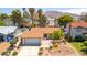 Nice single story home with a desert rock front yard and an attached garage at 4916 Carmichael Ave, Las Vegas, NV 89110