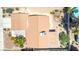 Aerial view of home featuring desert landscaping, a light brown roof, and a pool at 4916 Carmichael Ave, Las Vegas, NV 89110