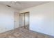 This is a simple bedroom with carpet, closet, and ceiling fan at 4916 Carmichael Ave, Las Vegas, NV 89110