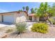 Charming single story house with well-kept desert rock front yard at 4916 Carmichael Ave, Las Vegas, NV 89110