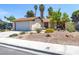 Inviting single-story home featuring desert landscaping and an attached garage at 4916 Carmichael Ave, Las Vegas, NV 89110