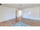 Spacious living room showcasing hardwood floors and an open layout at 4916 Carmichael Ave, Las Vegas, NV 89110