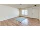 Inviting living room featuring hardwood floors and a bright window at 4916 Carmichael Ave, Las Vegas, NV 89110
