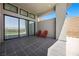Covered patio with red chairs perfect for enjoying the outdoor space at 5166 Stone View Dr, Las Vegas, NV 89135