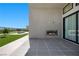 Outdoor patio with a built-in fireplace and sliding glass doors leading to the interior at 5166 Stone View Dr, Las Vegas, NV 89135