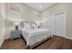 Inviting bedroom with hardwood floors, large windows, and ample closet space at 5166 Stone View Dr, Las Vegas, NV 89135