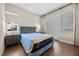 Comfortable bedroom featuring plush carpet, ensuite bath, and serene natural light at 5166 Stone View Dr, Las Vegas, NV 89135