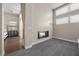Bedroom to bathroom featuring a fireplace, and neutral color scheme at 5166 Stone View Dr, Las Vegas, NV 89135
