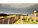 Panoramic city views from the property, showcasing the distant skyline and surrounding landscape under the night sky at 5166 Stone View Dr, Las Vegas, NV 89135
