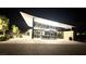 Night view of the community clubhouse with outdoor seating on a paved patio at 5166 Stone View Dr, Las Vegas, NV 89135