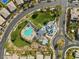 Aerial view of community pool, hot tub, splash pad, and seating at 5166 Stone View Dr, Las Vegas, NV 89135