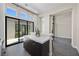 An open dining area has an island with seating and access to outdoor space through sliding glass doors at 5166 Stone View Dr, Las Vegas, NV 89135