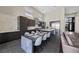 Eat-in kitchen with bar seating, stainless steel appliances, and modern finishes at 5166 Stone View Dr, Las Vegas, NV 89135
