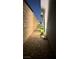 Charming exterior view showcases well-lit landscaping and a quaint walkway at 5166 Stone View Dr, Las Vegas, NV 89135