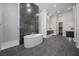Luxurious main bathroom featuring soaking tub, walk-in shower, and stylish finishes at 5166 Stone View Dr, Las Vegas, NV 89135