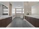 Luxurious main bathroom features dual vanities, a soaking tub, and modern fixtures at 5166 Stone View Dr, Las Vegas, NV 89135
