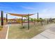 Community playground with modern equipment and shaded areas for Gathering fun at 5166 Stone View Dr, Las Vegas, NV 89135