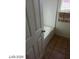 Bathroom featuring tile flooring, a tub and a towel hanging on the wall at 5308 La Quinta Hills St, North Las Vegas, NV 89081