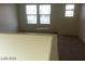 Hallway showcasing windows providing ample natural light at 5308 La Quinta Hills St, North Las Vegas, NV 89081
